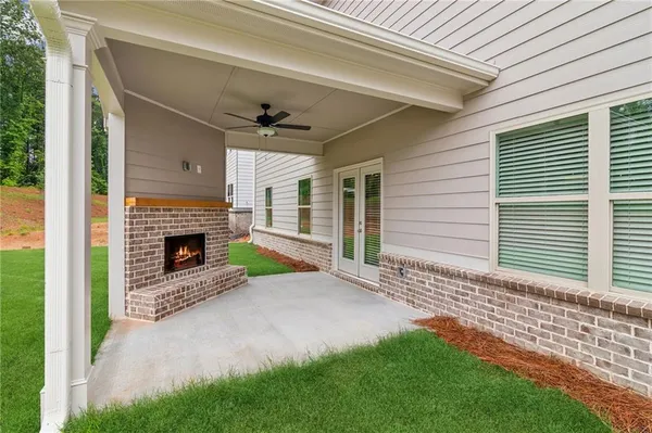 a view of a porch with a fireplace