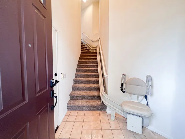 a view of entryway with stairs