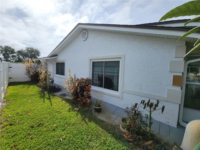 a house view with a garden space
