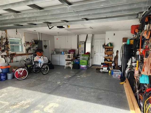 a view of a garage with a lot of stuff and toys