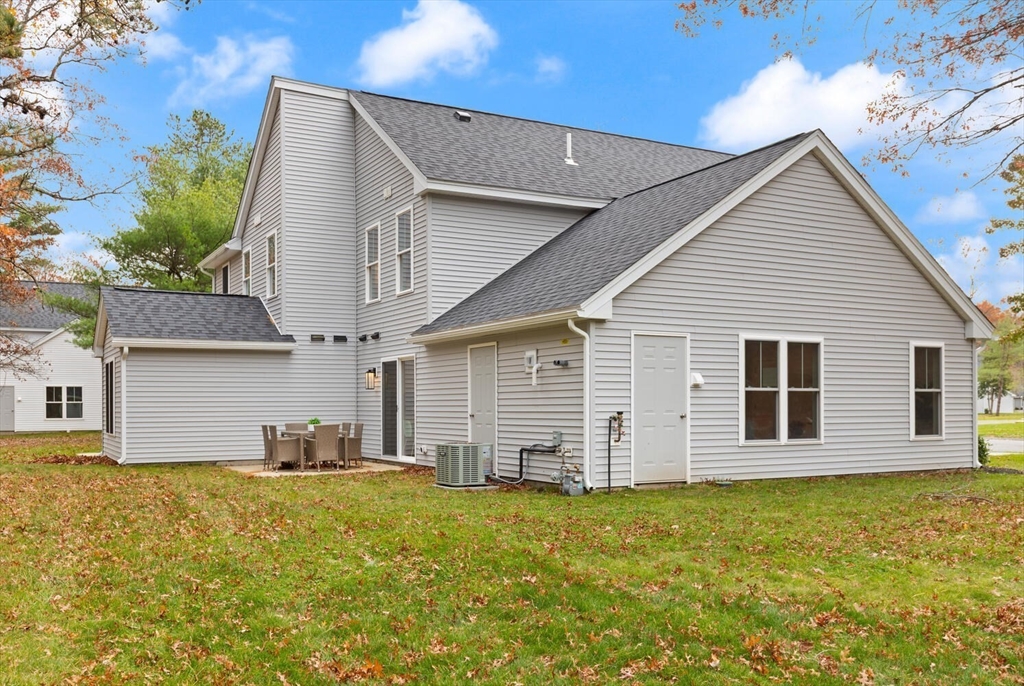 9 Barracks Road, Unit 9 Hudson, MA 01749 - Photo 15 of 16 a view of a house with backyard