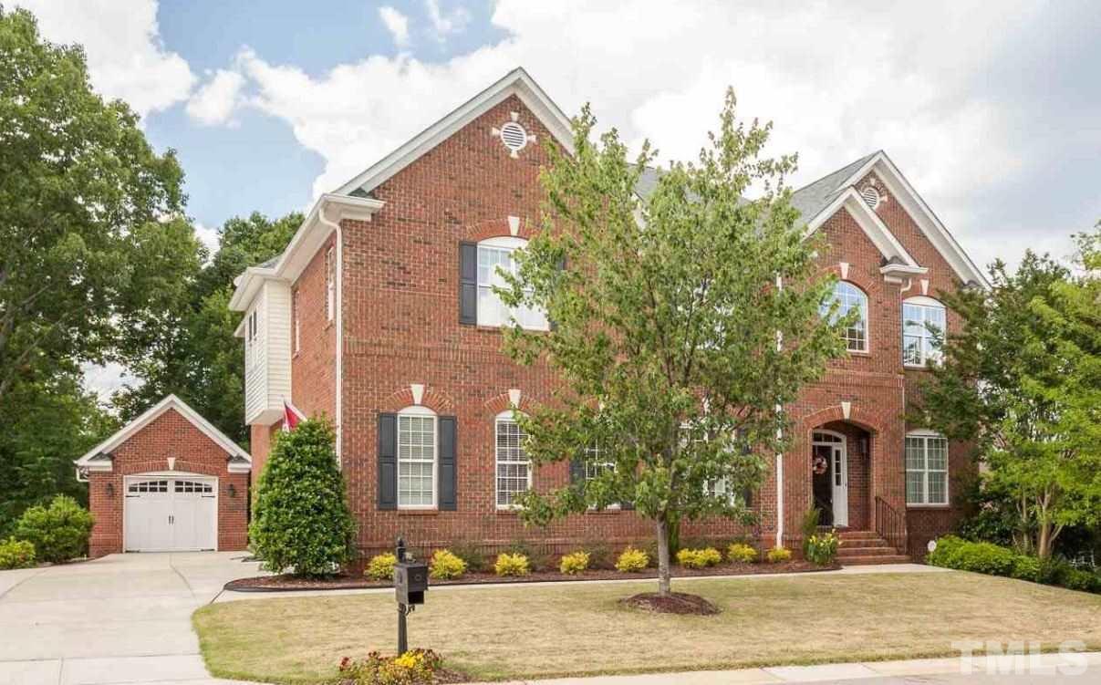 2913 Elmfield Street Raleigh, NC 27614 - Photo 2 of 30 All Brick Exterior showcasing Third Car Garage