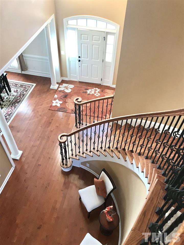2913 Elmfield Street Raleigh, NC 27614 - Photo 14 of 30 Entryway showcasing hardwood flooring.