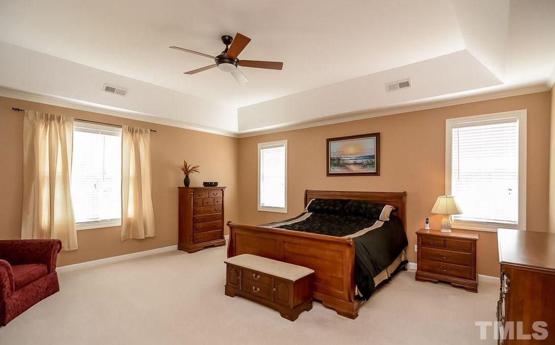 2913 Elmfield Street Raleigh, NC 27614 - Photo 16 of 30 Spacious master bedroom with tray ceiling