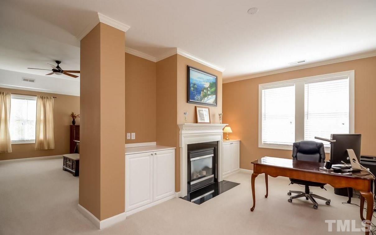 2913 Elmfield Street Raleigh, NC 27614 - Photo 17 of 30 Master bedroom sitting area with cozy fireplace which can be used as office space