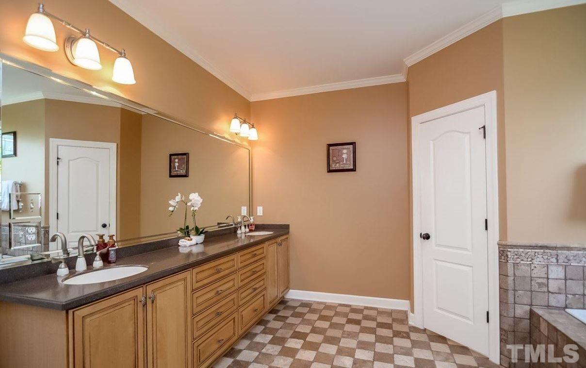 2913 Elmfield Street Raleigh, NC 27614 - Photo 19 of 30 Spacious master bathroom with double vanity and sinks