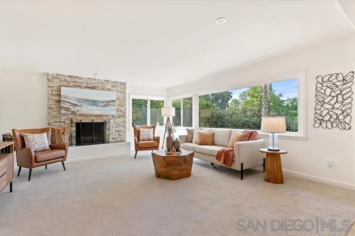 13311 Fallen Leaf Road Poway, CA 92064 - Photo 4 of 30 a living room with furniture and a fireplace