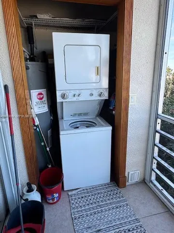 a view of swimming pool with an outdoor seating
