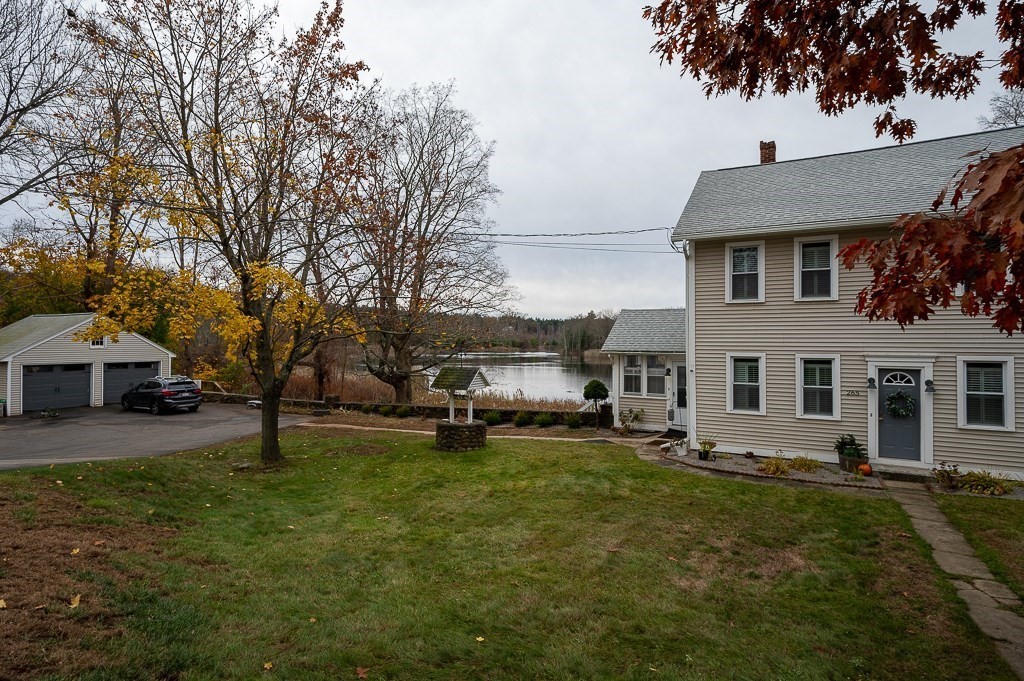 265 Main Street Sturbridge, MA 01566 - Photo 1 of 25 a view of a house with a yard