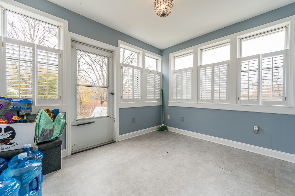 265 Main Street Sturbridge, MA 01566 - Photo 16 of 25 an empty room with furniture and windows