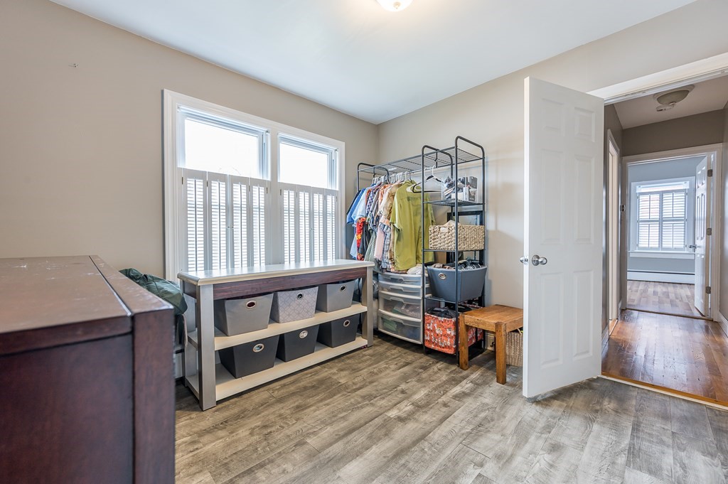 265 Main Street Sturbridge, MA 01566 - Photo 25 of 25 a bedroom with furniture and a window