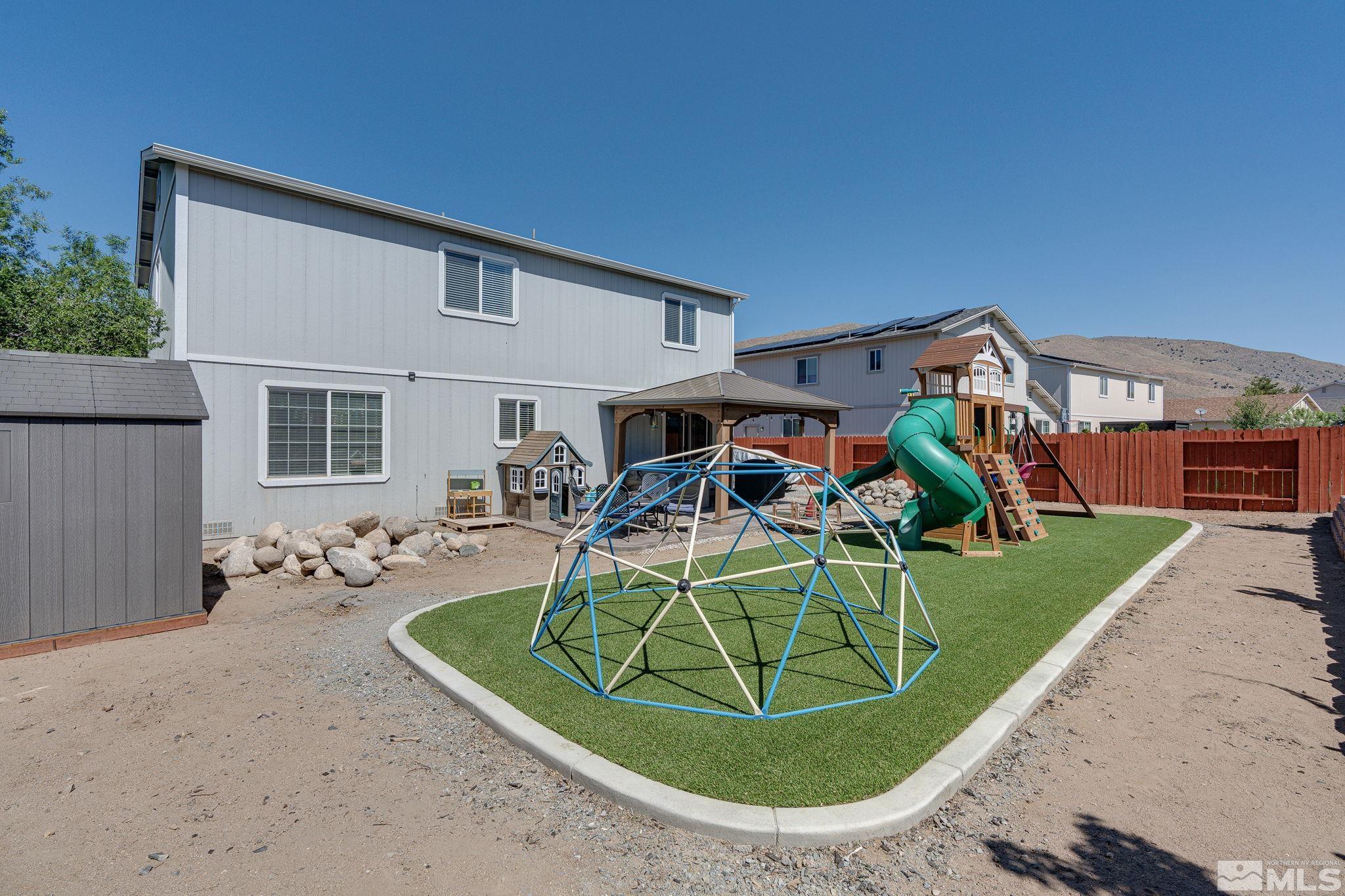 18198 Pin Oak Court Reno, NV 89508 - Photo 35 of 39 front view of a house with a patio