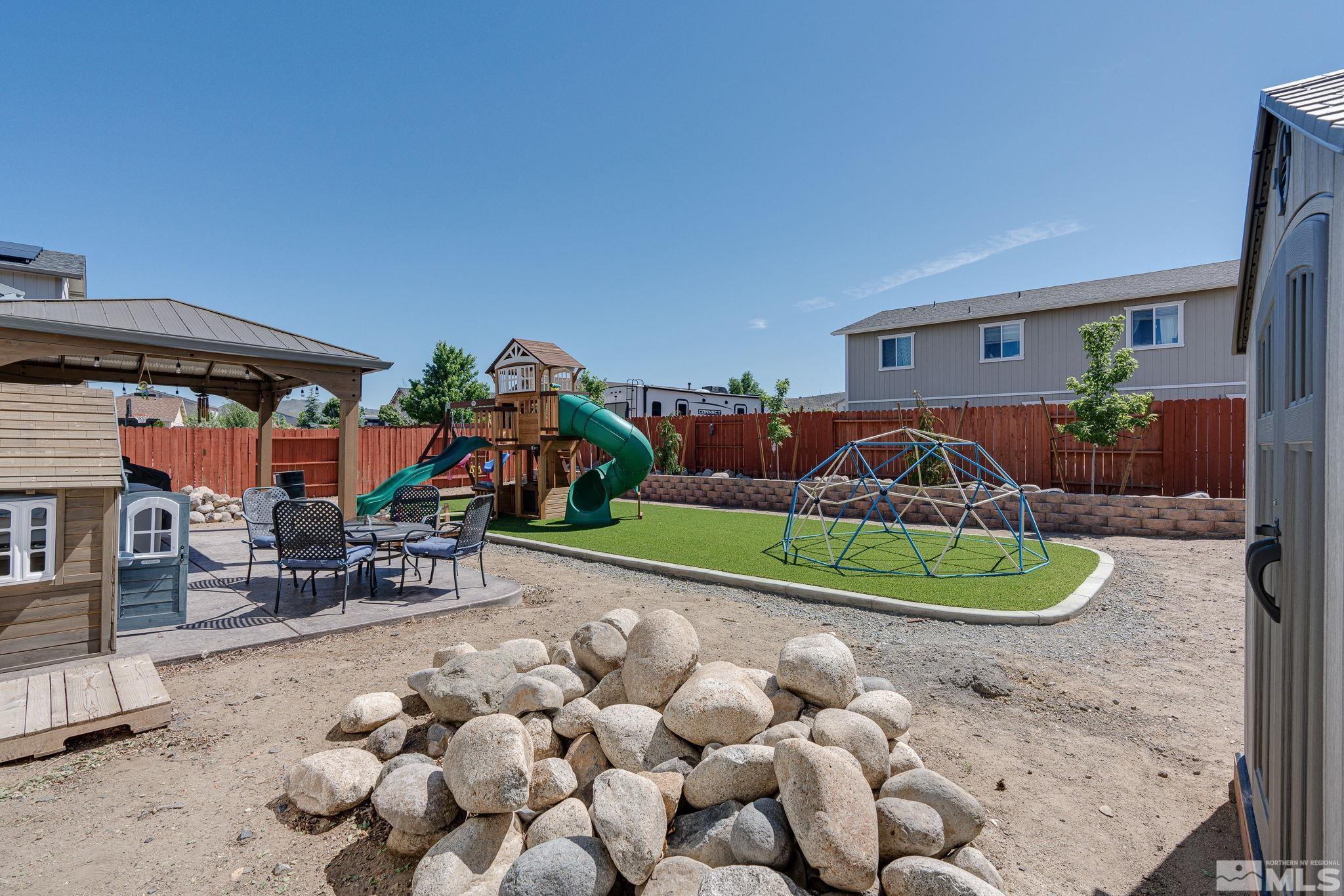 18198 Pin Oak Court Reno, NV 89508 - Photo 37 of 39 a front view of a house with garden