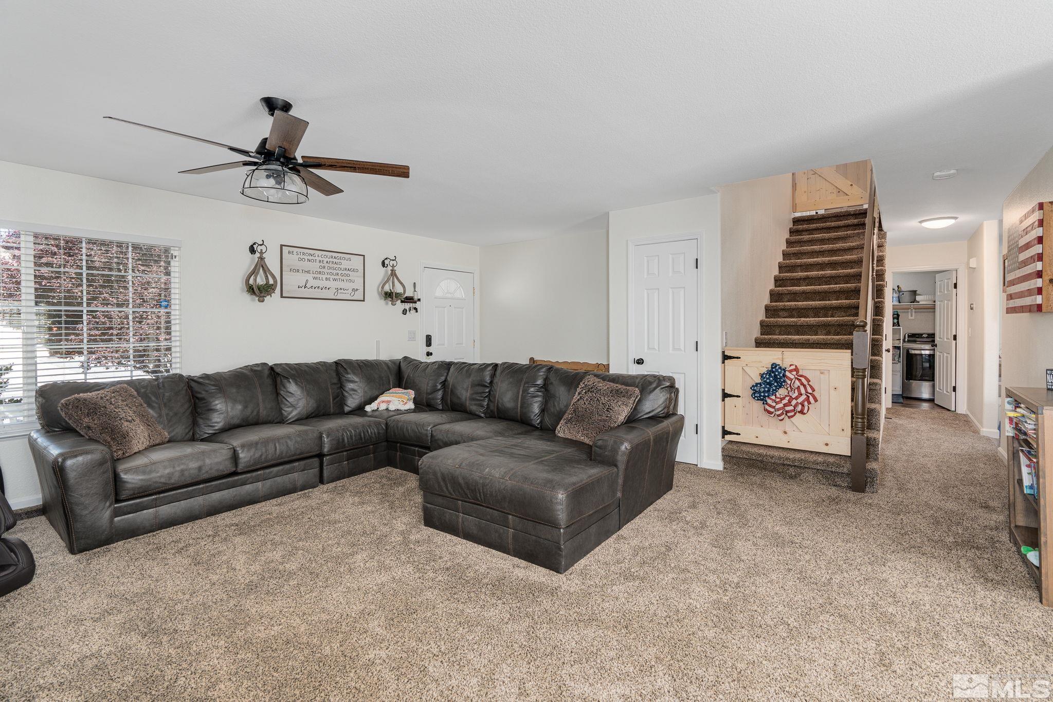 18198 Pin Oak Court Reno, NV 89508 - Photo 5 of 39 a living room with furniture and a ceiling fan