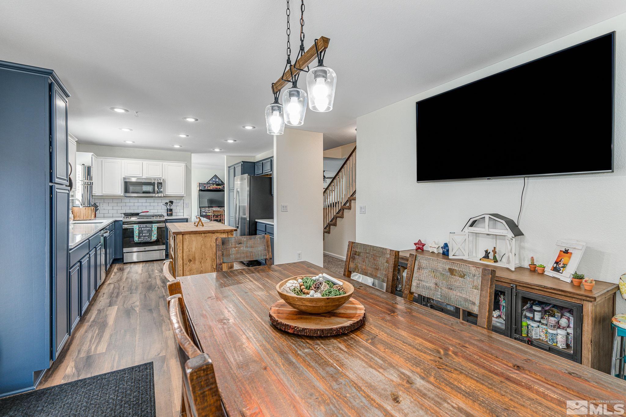 18198 Pin Oak Court Reno, NV 89508 - Photo 8 of 39 a living room with furniture and a flat screen tv