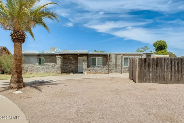 a view of a terrace with a big yard