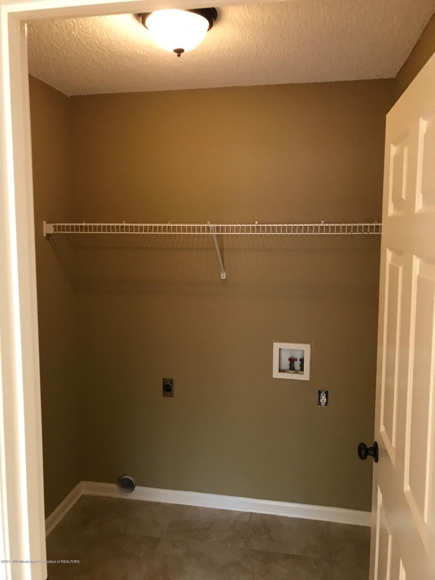 7654 Meadow Ridge Lane Olive Branch, MS 38654 - Photo 19 of 20 Laundry Room