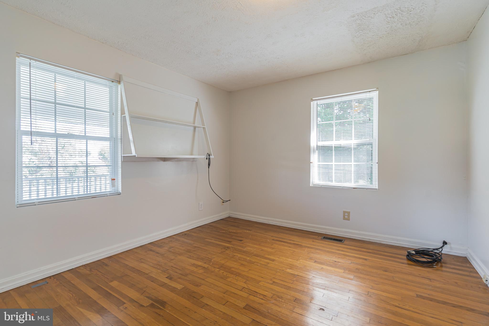 8281 Solomons Island Road Owings, MD 20736 - Photo 41 of 44 Main level front bedroom