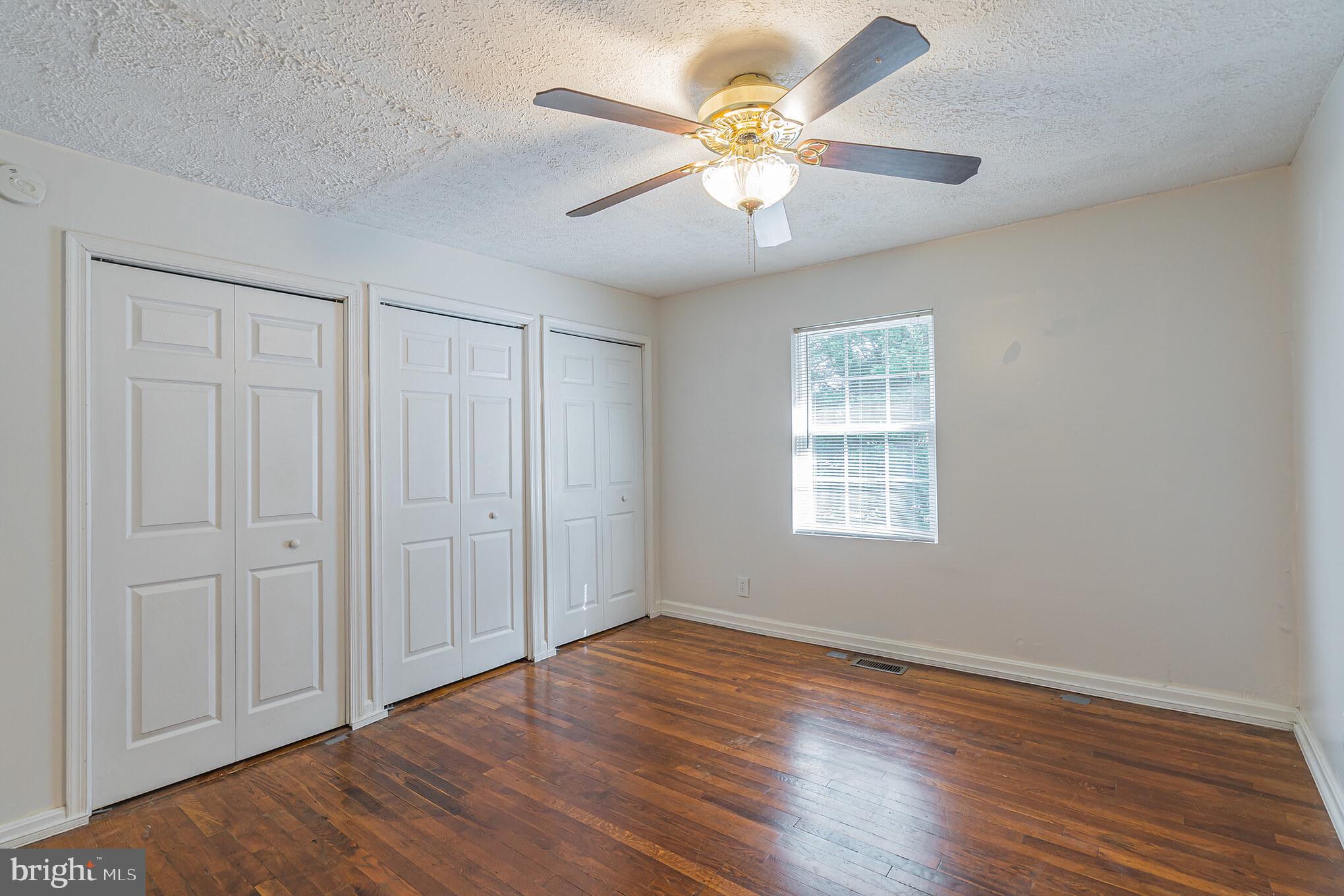 8281 Solomons Island Road Owings, MD 20736 - Photo 42 of 44 Main level front 2nd bedroom