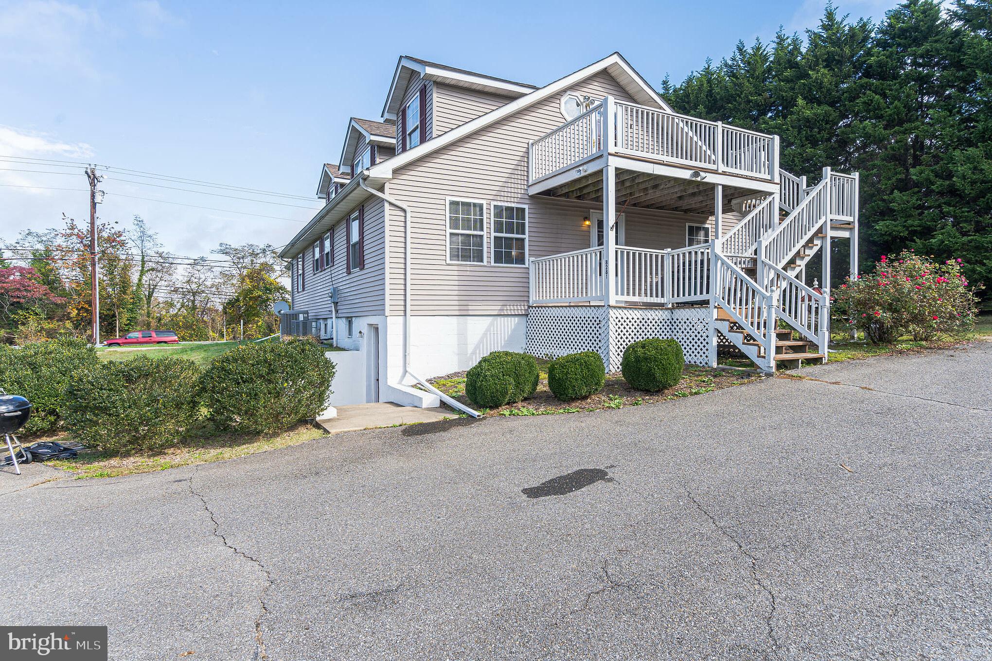 8281 Solomons Island Road Owings, MD 20736 - Photo 44 of 44 Back of building with lots of parking