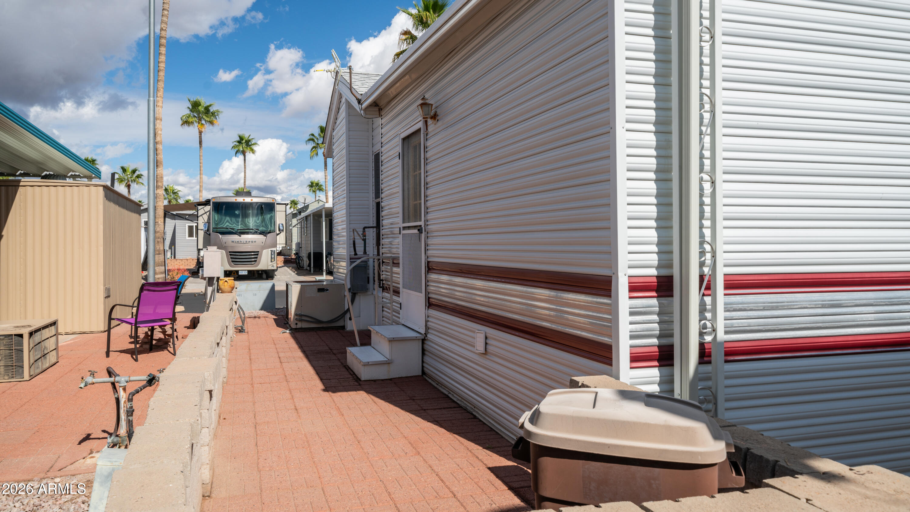 3710 South Goldfield Road, Unit 972 Apache Junction, AZ 85119 - Photo 11 of 60 3710 S Goldfield Rd Lot 972 Exterior-11