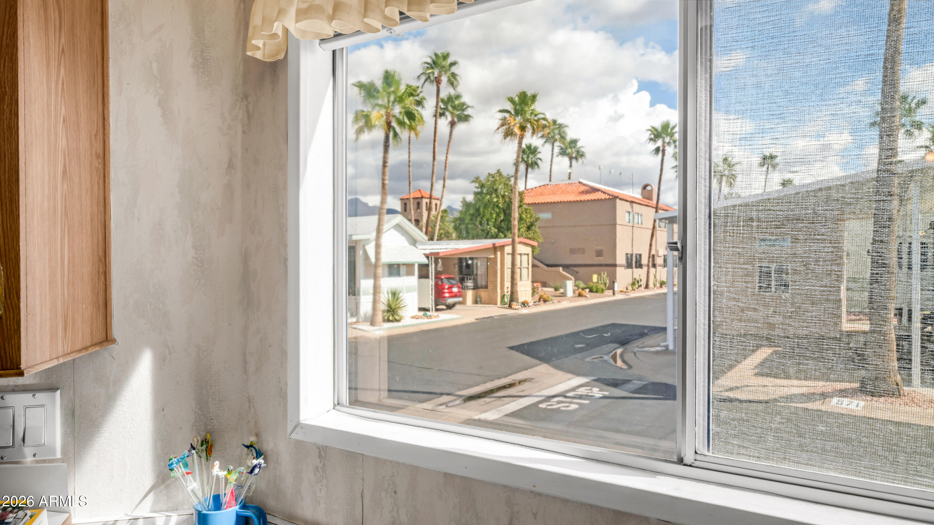 3710 South Goldfield Road, Unit 972 Apache Junction, AZ 85119 - Photo 21 of 60 view of living room and window
