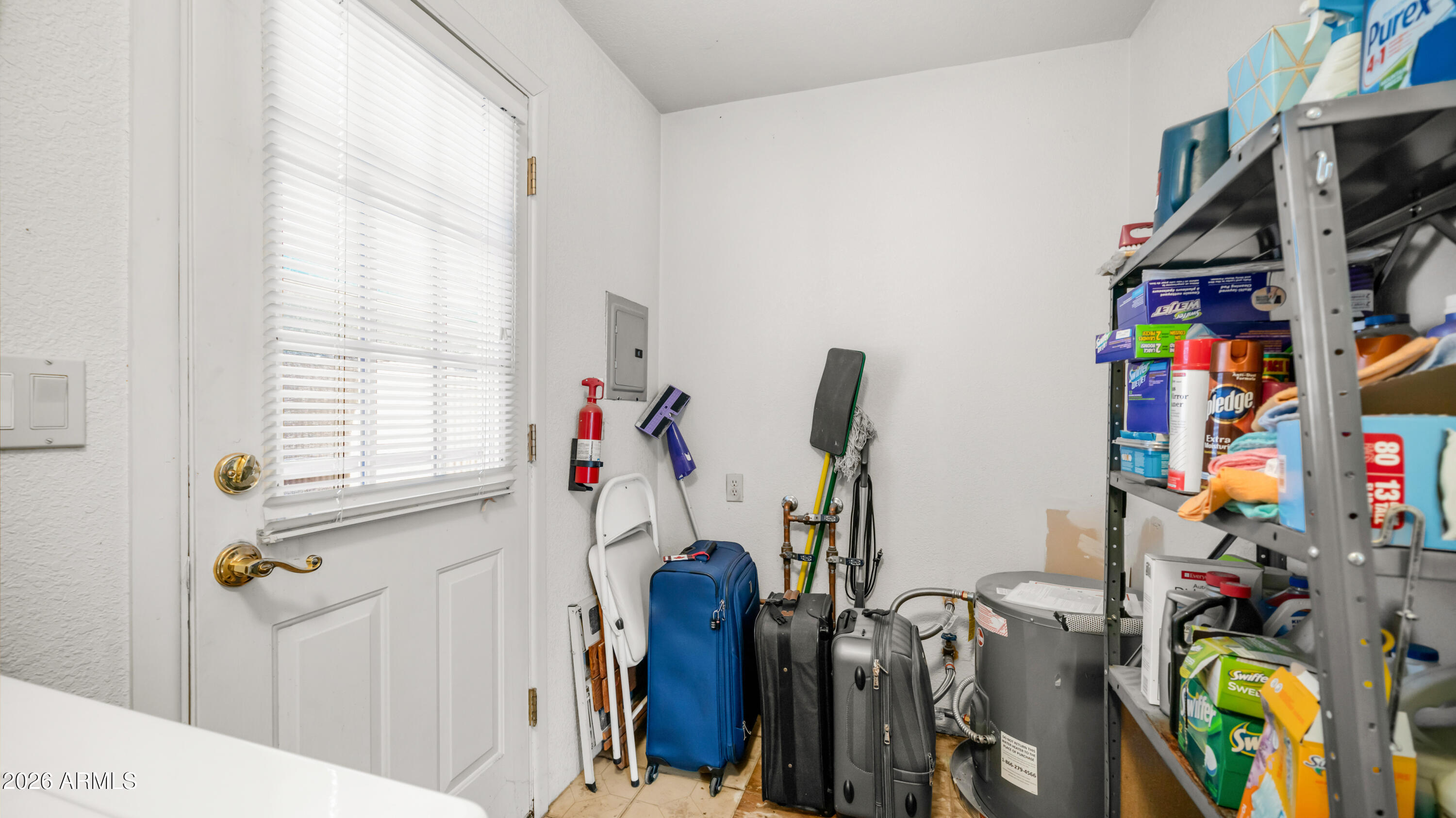 3710 South Goldfield Road, Unit 972 Apache Junction, AZ 85119 - Photo 28 of 60 a view of walk in closet with clothes and shoes
