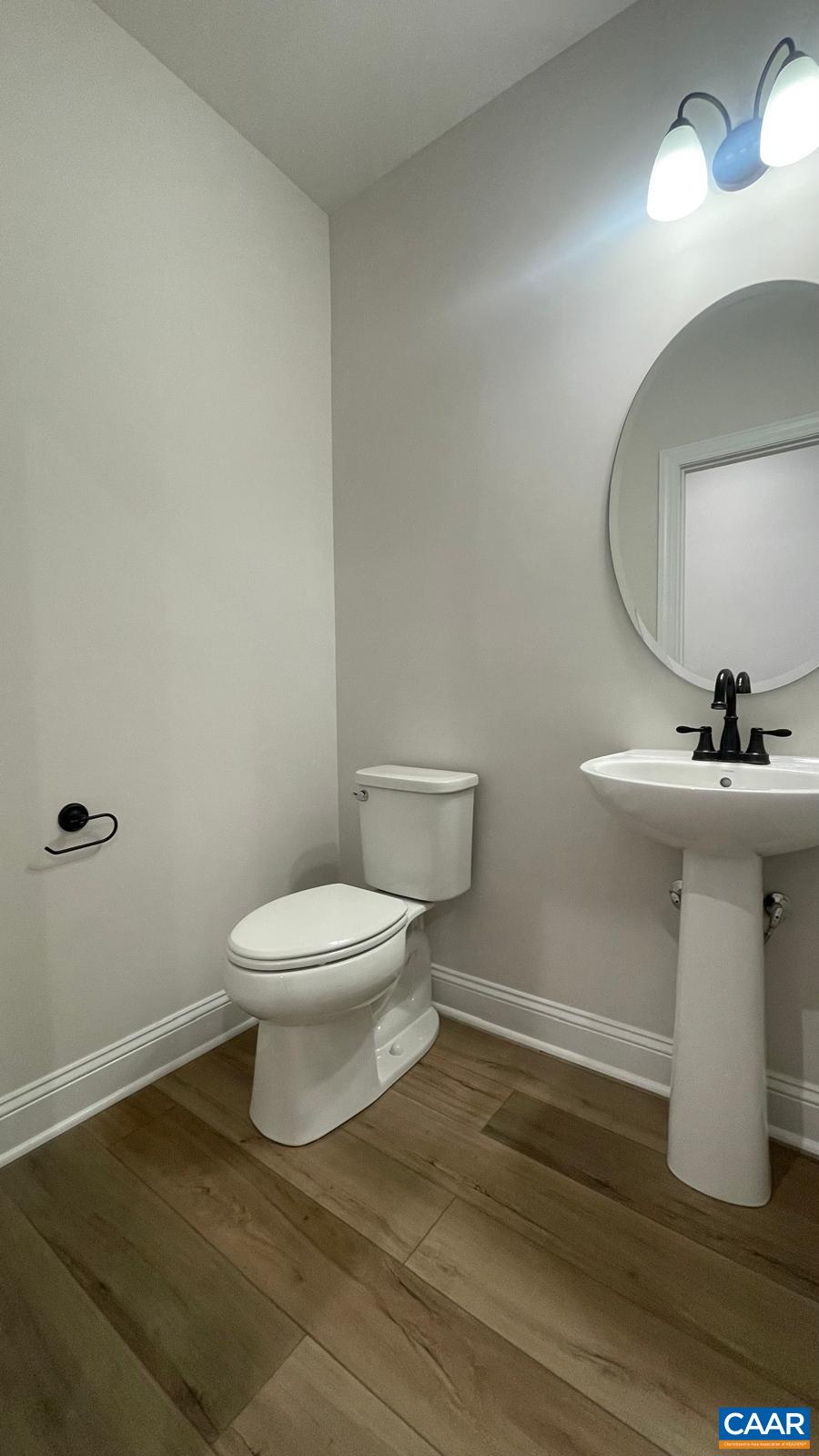 4006 Varick Street Charlottesville, VA 22901 - Photo 29 of 33 a bathroom with a toilet a sink and mirror