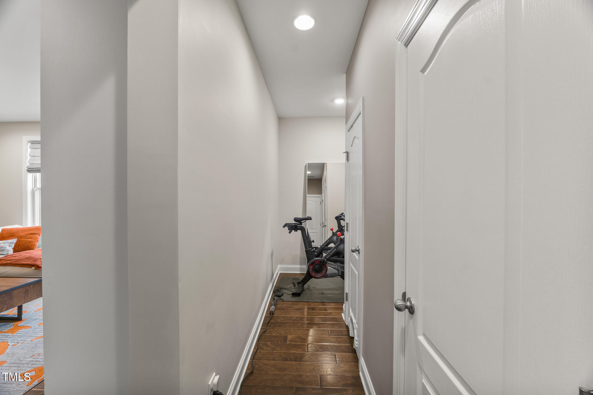 1715 Capstone Drive Durham, NC 27713 - Photo 20 of 53 a view of a livingroom from a hallway