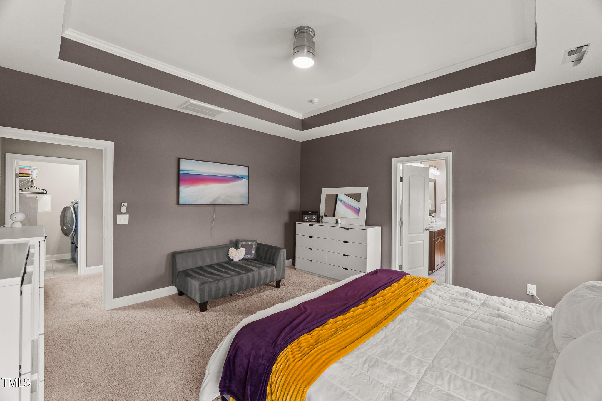 1715 Capstone Drive Durham, NC 27713 - Photo 24 of 53 a bedroom with two beds and a chandelier
