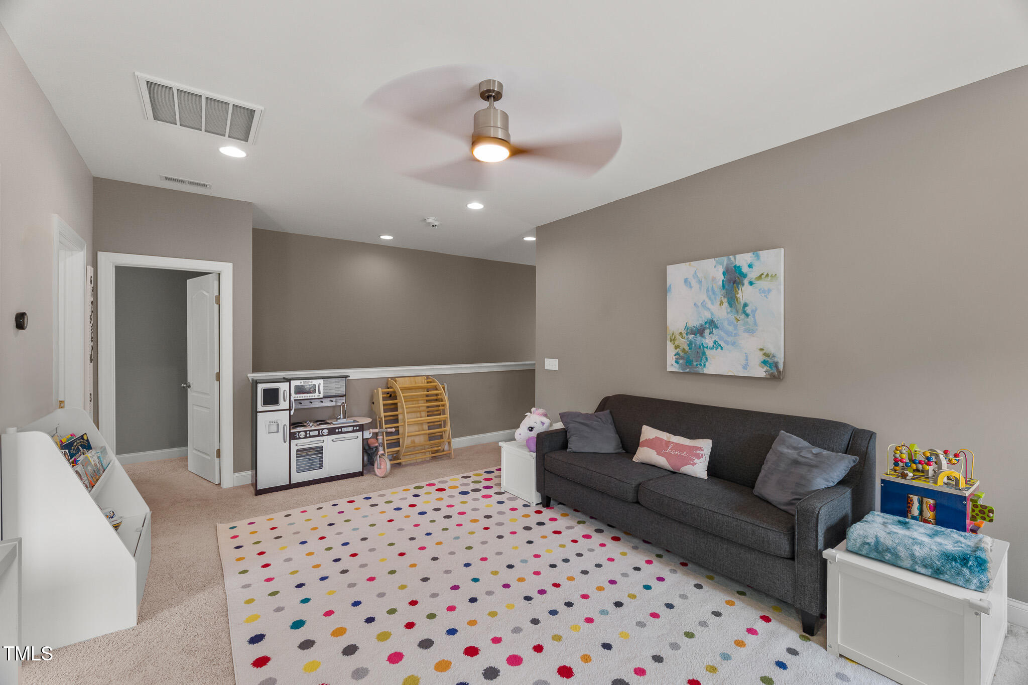 1715 Capstone Drive Durham, NC 27713 - Photo 35 of 53 a living room with furniture and a couch