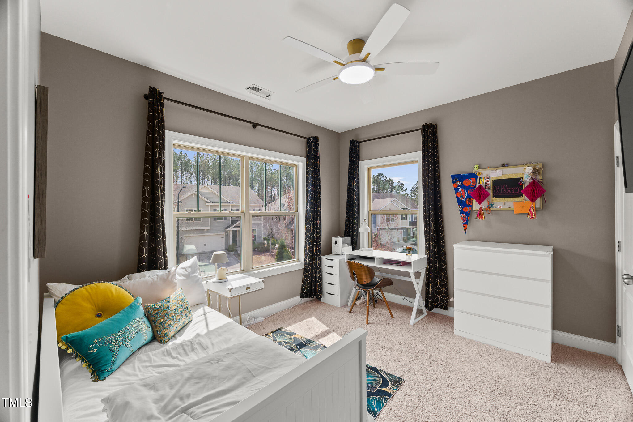 1715 Capstone Drive Durham, NC 27713 - Photo 36 of 53 a living room with furniture and a large window