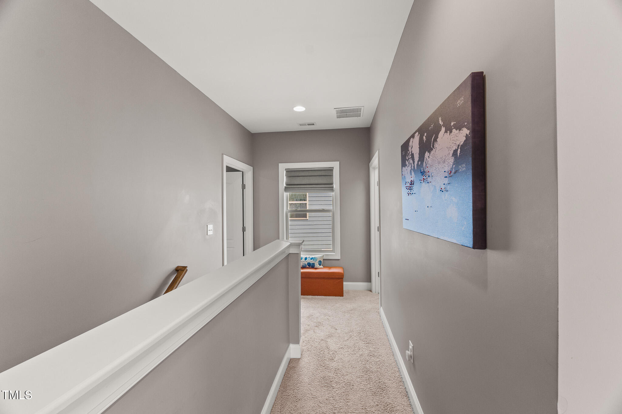 1715 Capstone Drive Durham, NC 27713 - Photo 41 of 53 a hallway with painting on the wall