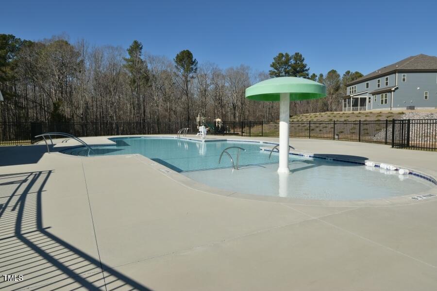 1715 Capstone Drive Durham, NC 27713 - Photo 49 of 53 a view of a swimming pool with a patio