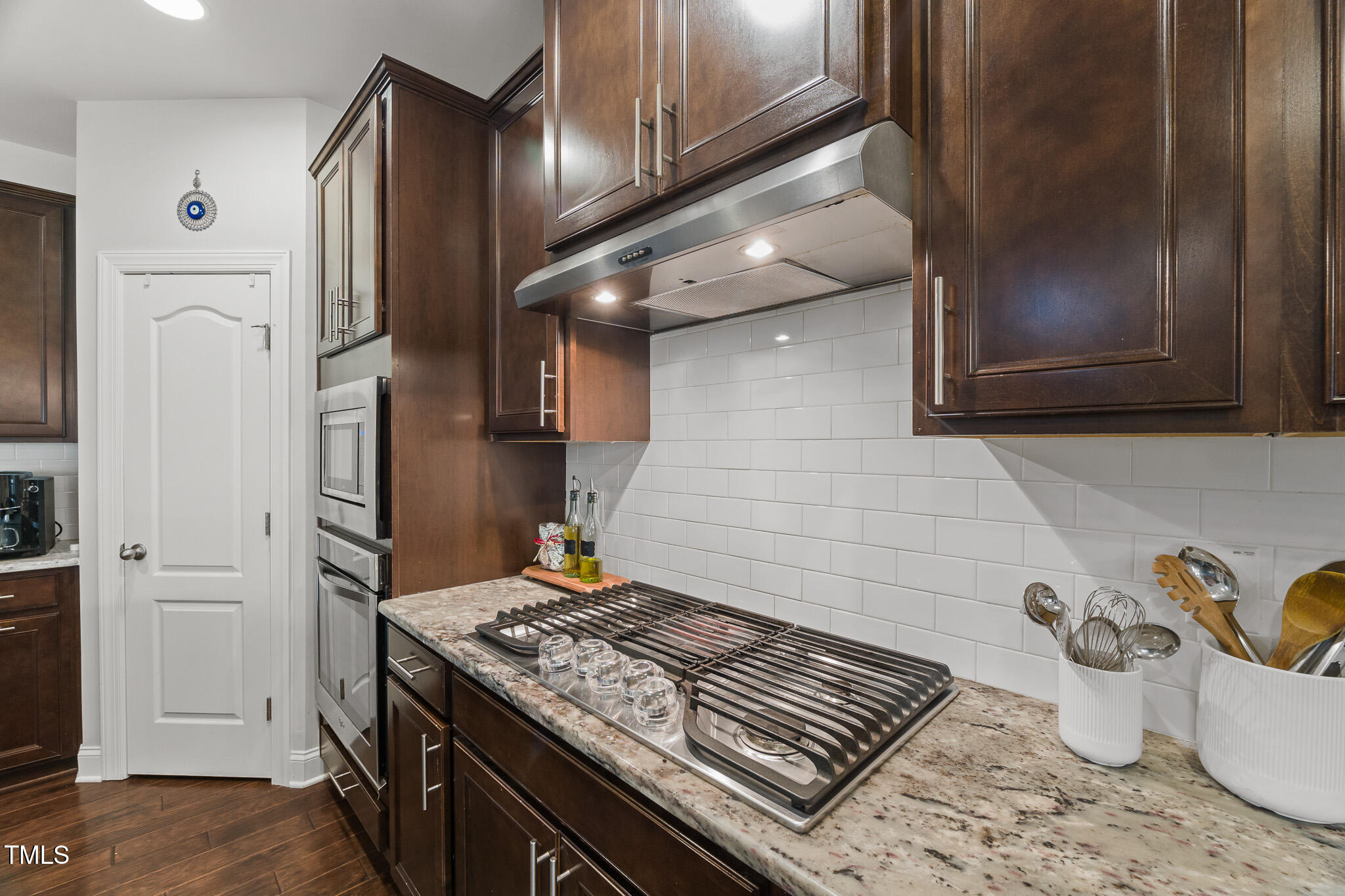 1715 Capstone Drive Durham, NC 27713 - Photo 9 of 53 a stove top oven sitting inside of a kitchen