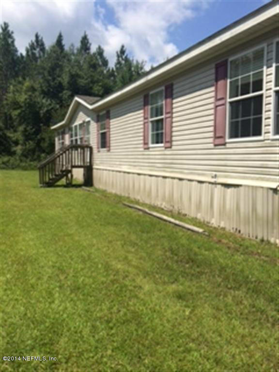 11704 Cow Pen Road Sanderson, FL 32087 - Photo 1 of 13 Front Exterior