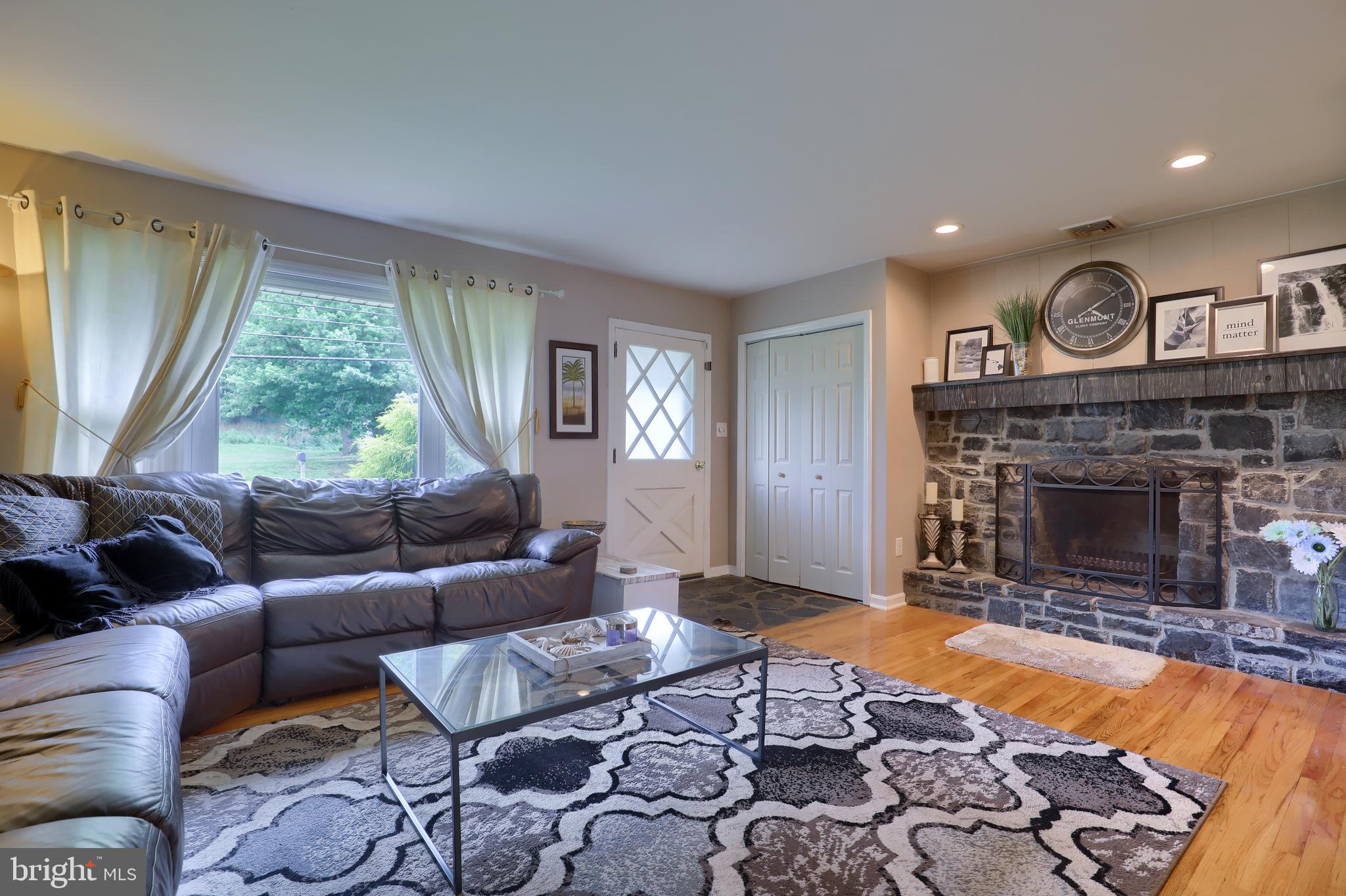 621 Valley Road Lancaster, PA 17601 - Photo 8 of 37 a living room with furniture and a fireplace