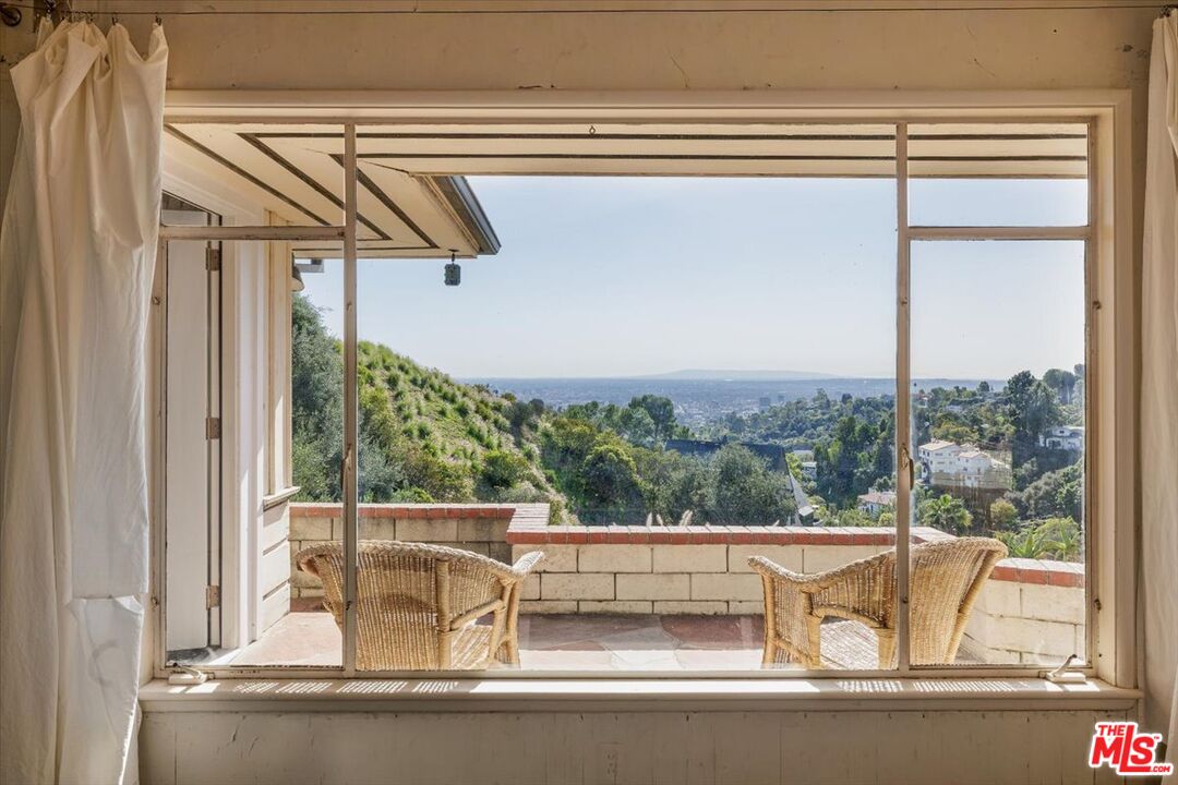 3200 Deronda Drive Los Angeles, CA 90068 - Photo 12 of 28 a view of a living room and a window