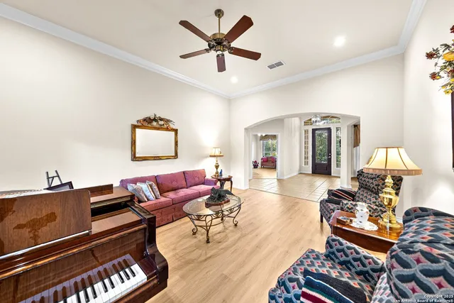 a kitchen with stainless steel appliances kitchen island granite countertop a stove and a sink