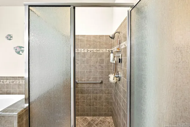 a view of a livingroom with workspace and a window