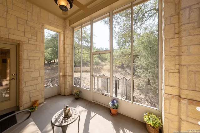 an aerial view of residential houses with city view