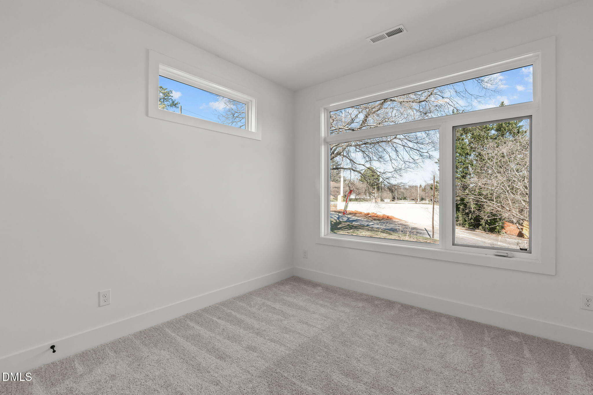 600 Rocky Knob Court Raleigh, NC 27601 - Photo 13 of 49 an empty room with a window