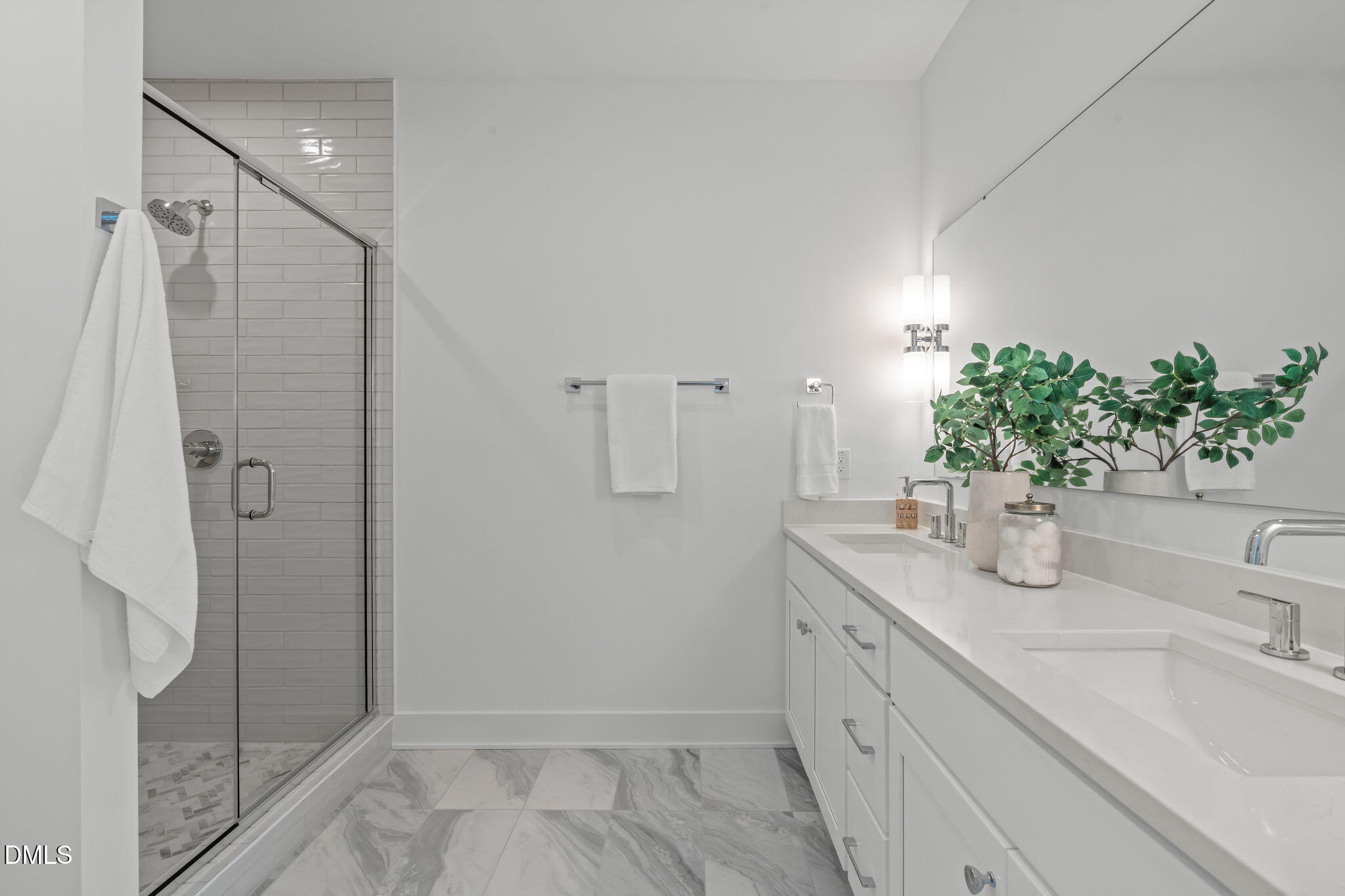600 Rocky Knob Court Raleigh, NC 27601 - Photo 21 of 49 a bathroom with a granite countertop sink a shower and a mirror