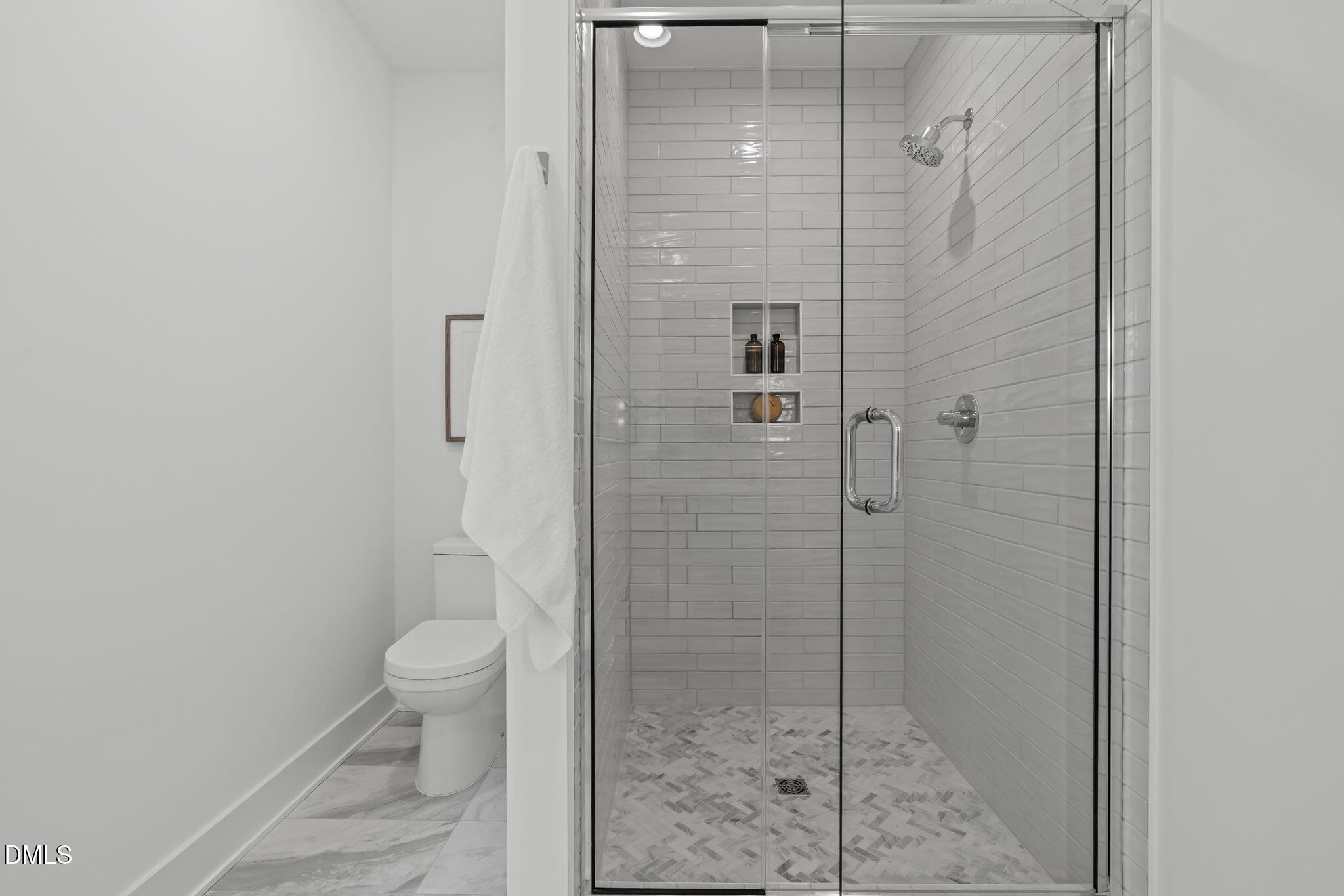 600 Rocky Knob Court Raleigh, NC 27601 - Photo 23 of 49 a bathroom with a shower and toilet