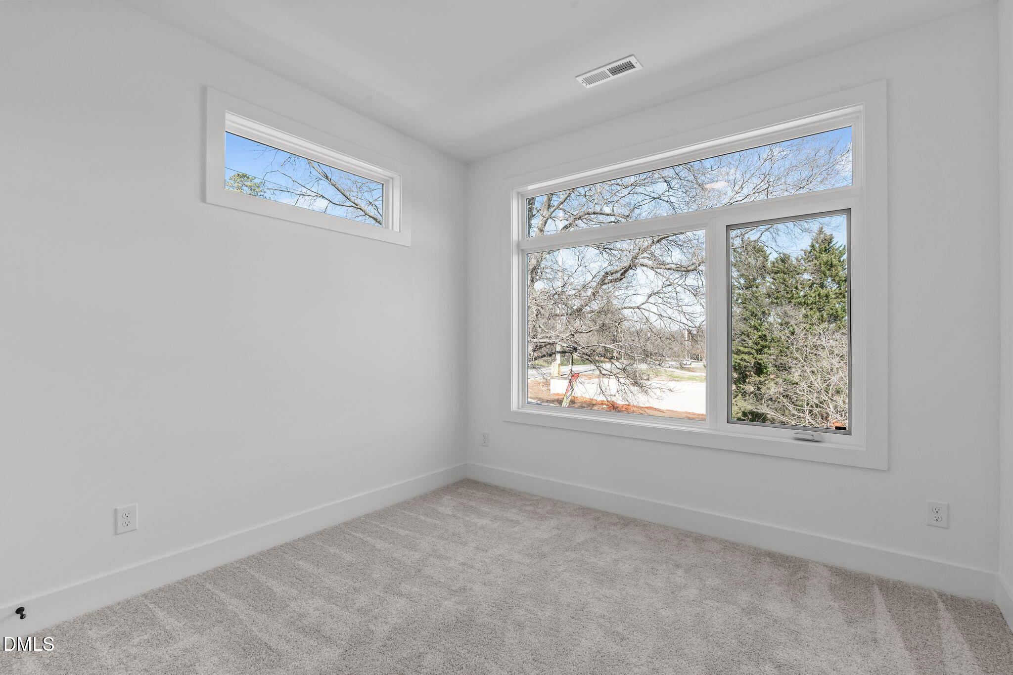 600 Rocky Knob Court Raleigh, NC 27601 - Photo 25 of 49 a view of an empty room with a window