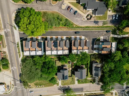 an aerial view of a house with a garden