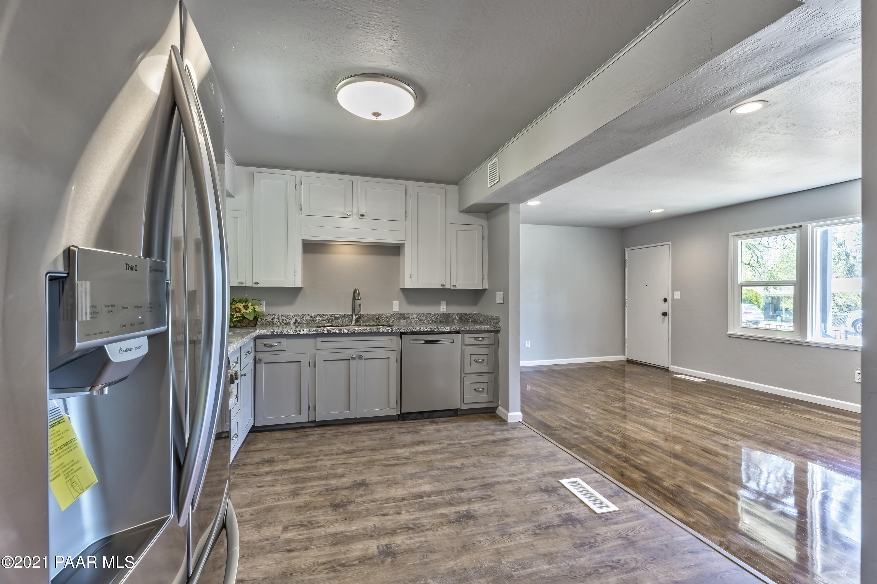 844 Flora Street Prescott, AZ 86301 - Photo 11 of 29 a kitchen with a refrigerator sink and stove