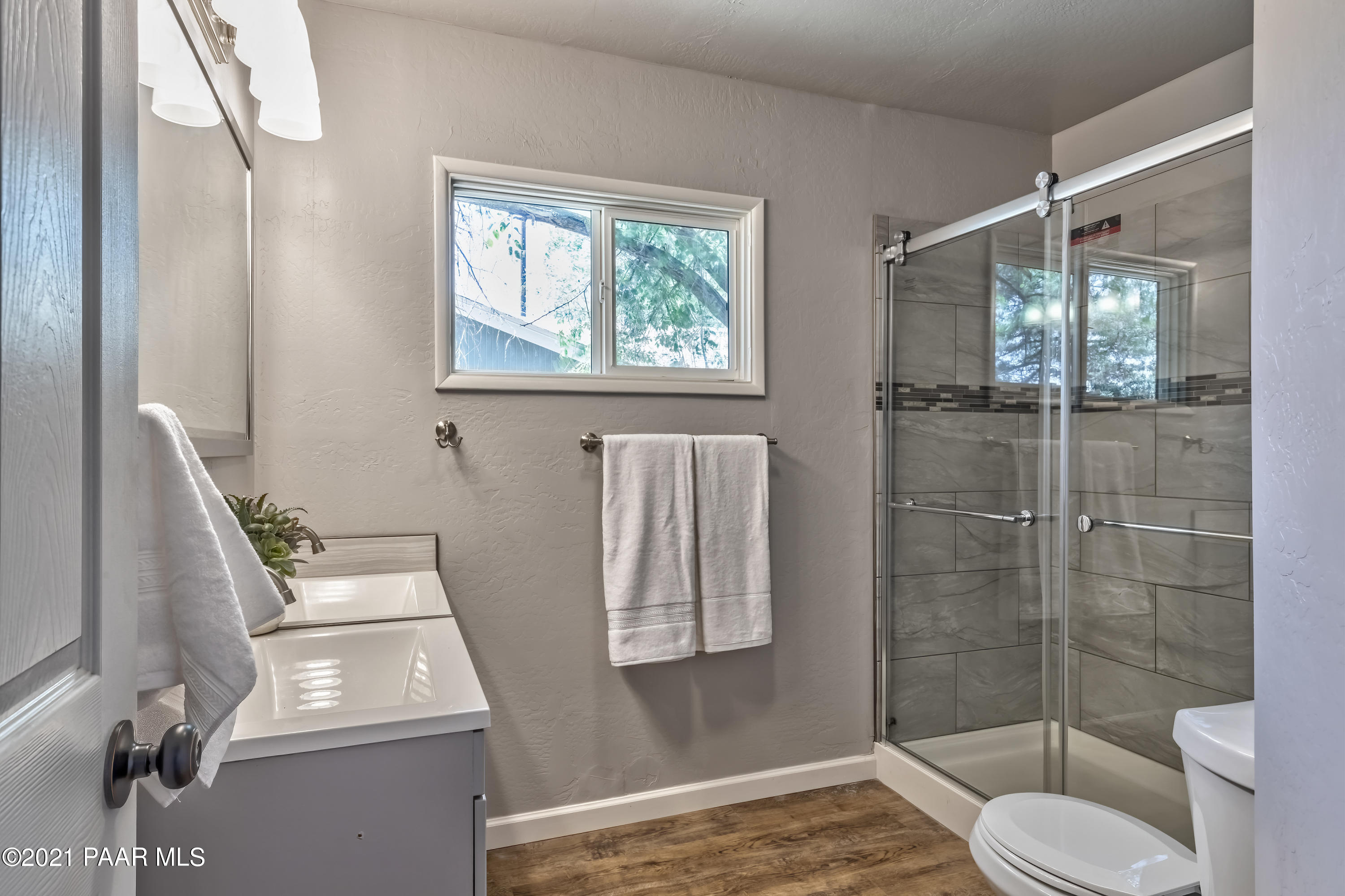 844 Flora Street Prescott, AZ 86301 - Photo 14 of 29 a bathroom with a toilet and a shower