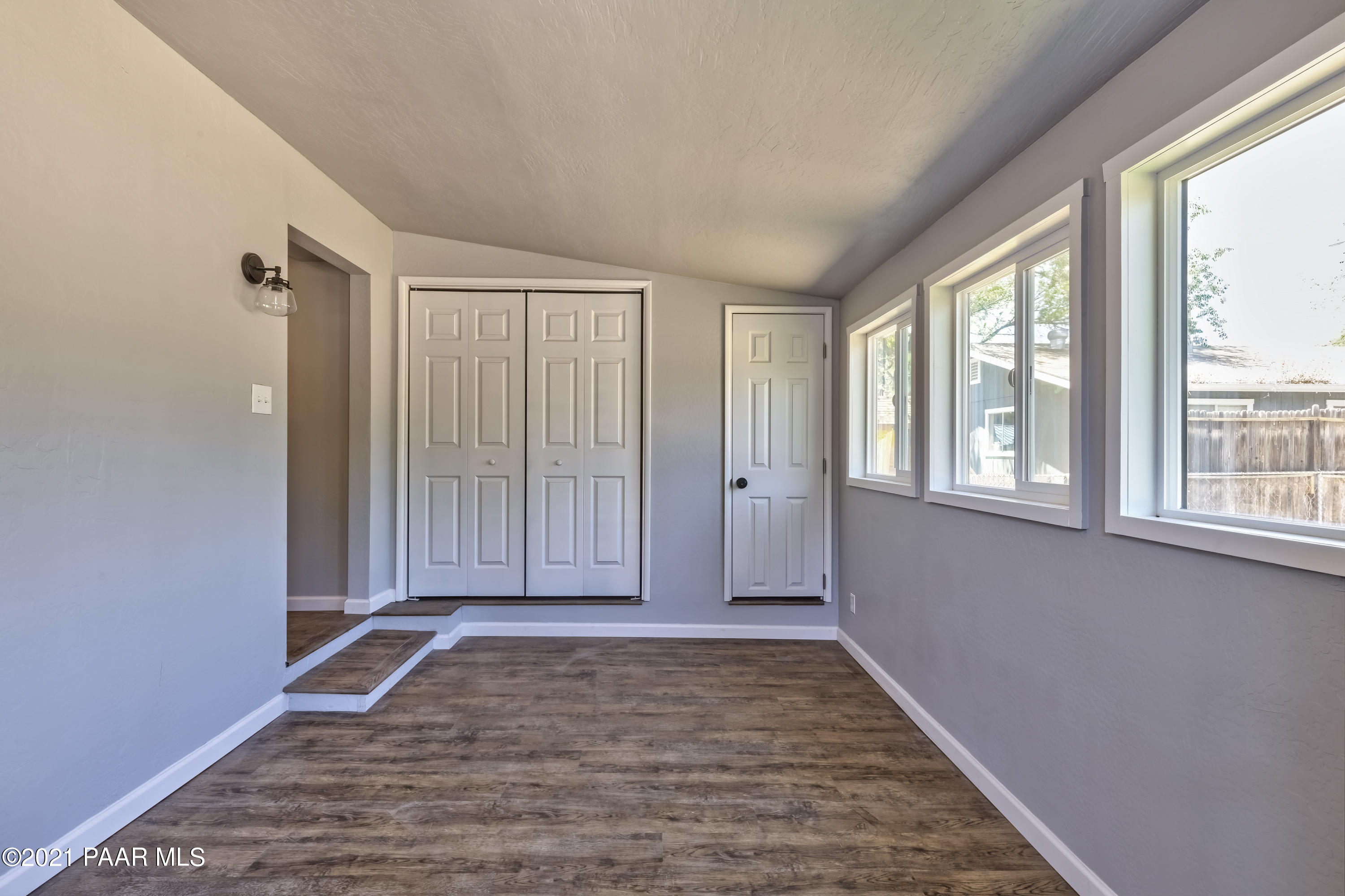 844 Flora Street Prescott, AZ 86301 - Photo 16 of 29 a view of an entryway with wooden floor and walls