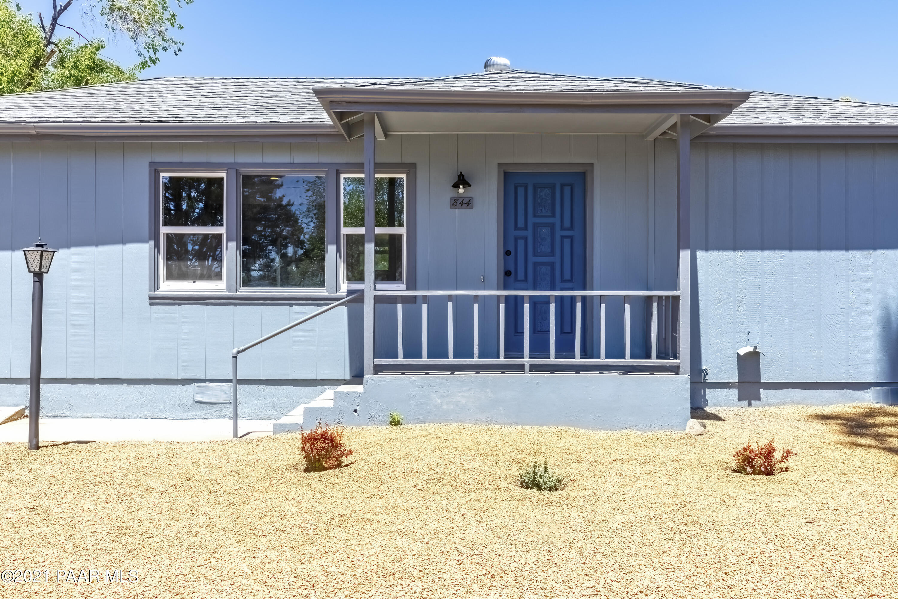 844 Flora Street Prescott, AZ 86301 - Photo 4 of 29 a view of a house with a yard